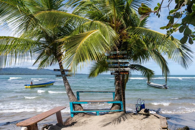 Tropical beach scene with ocean and lush green trees. Puerto Viejo de Talamanca, Costa Rica, 2024, © Dirk Heurich, dirksn.com