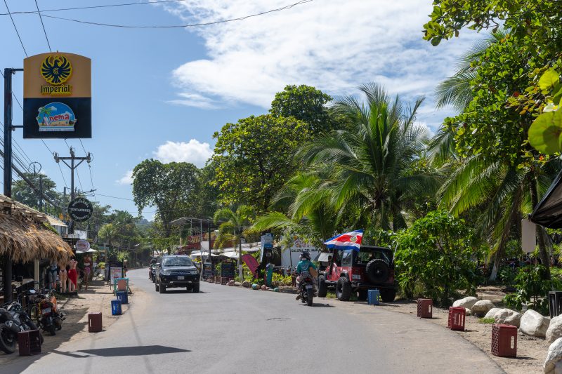 Tropical beach scene with ocean and lush green trees. Puerto Viejo de Talamanca, Costa Rica, 2024, © Dirk Heurich, dirksn.com