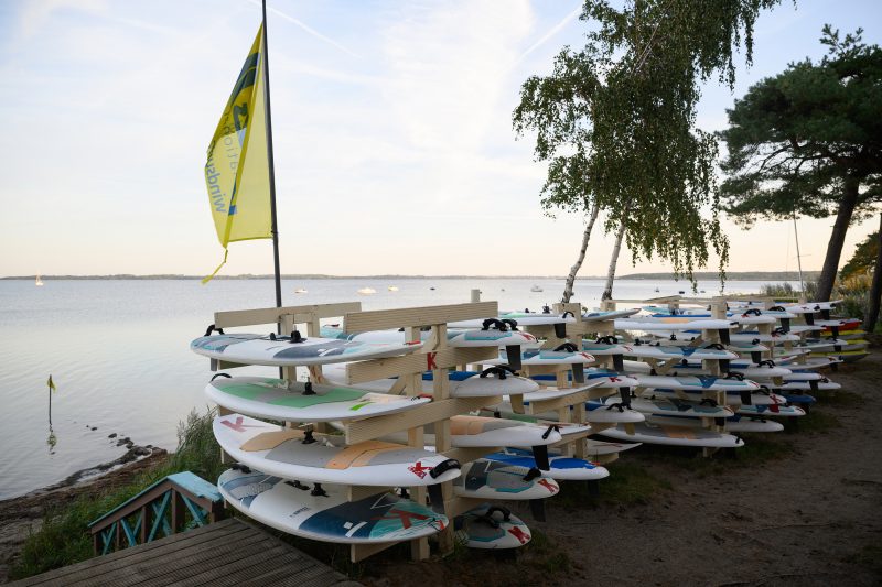 Kayaking pink plush toy on calm lake Copyright Dirk Heurich dirksn.com