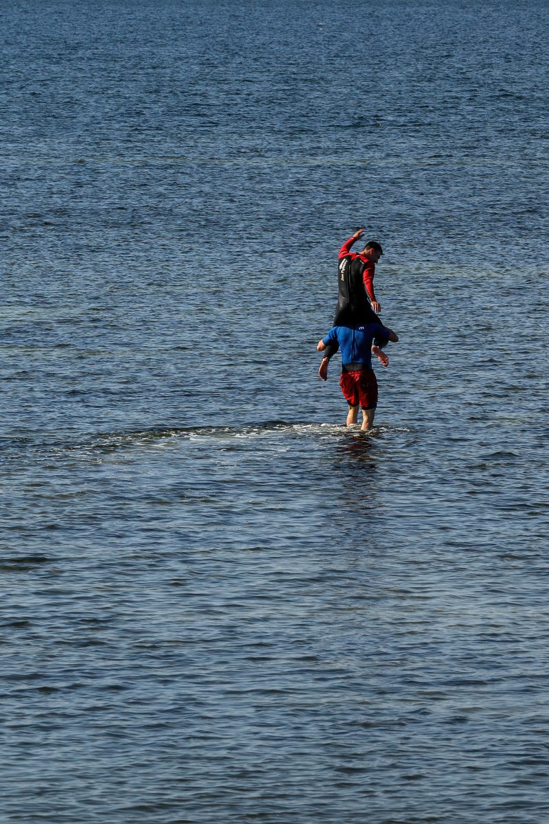 Kayaking pink plush toy on calm lake Copyright Dirk Heurich dirksn.com