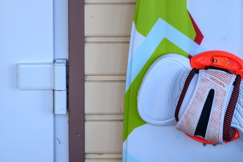 Kayaking pink plush toy on calm lake Copyright Dirk Heurich dirksn.com