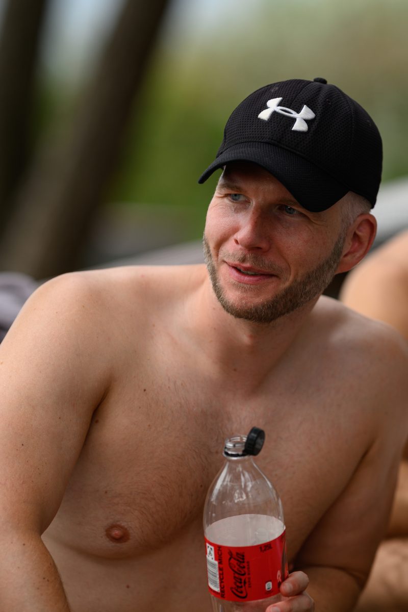 Kayaking pink plush toy on calm lake Copyright Dirk Heurich dirksn.com