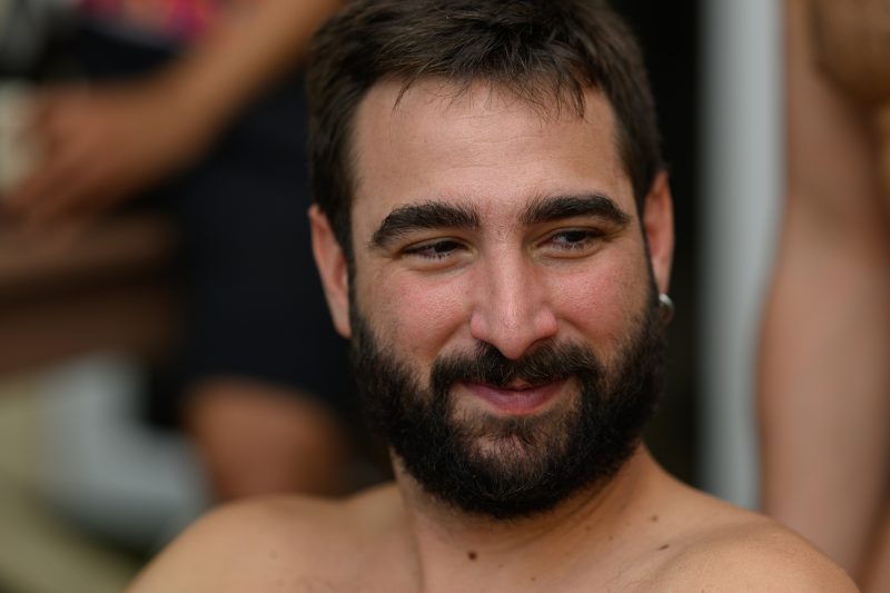 Kayaking pink plush toy on calm lake Copyright Dirk Heurich dirksn.com