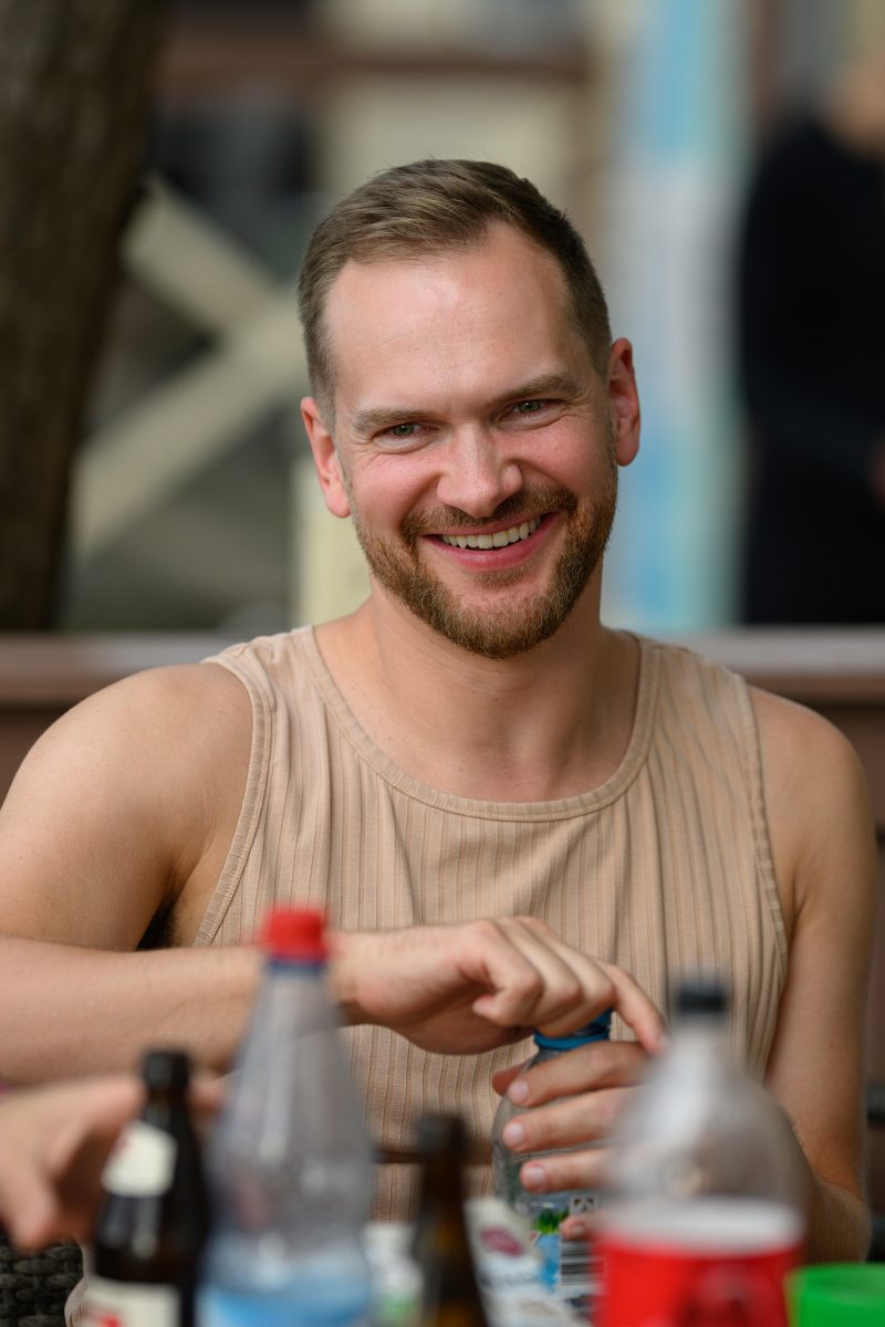 Kayaking pink plush toy on calm lake Copyright Dirk Heurich dirksn.com