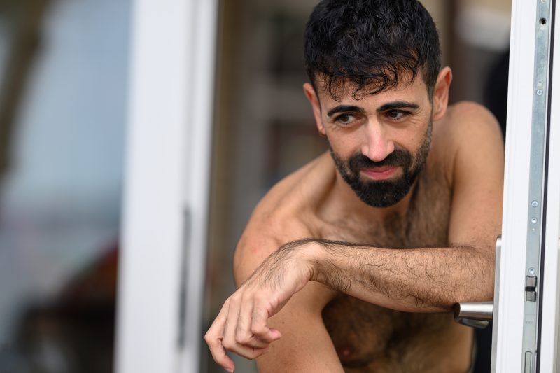 Kayaking pink plush toy on calm lake Copyright Dirk Heurich dirksn.com