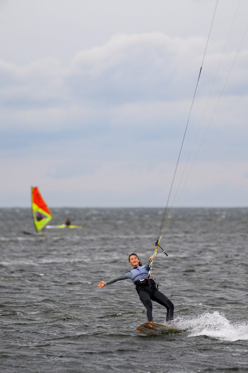 Kayaking pink plush toy on calm lake Copyright Dirk Heurich dirksn.com