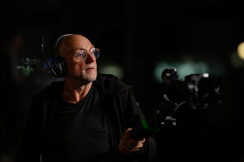 Man speaking into microphone at an event © Dirk Heurich dirksn.com