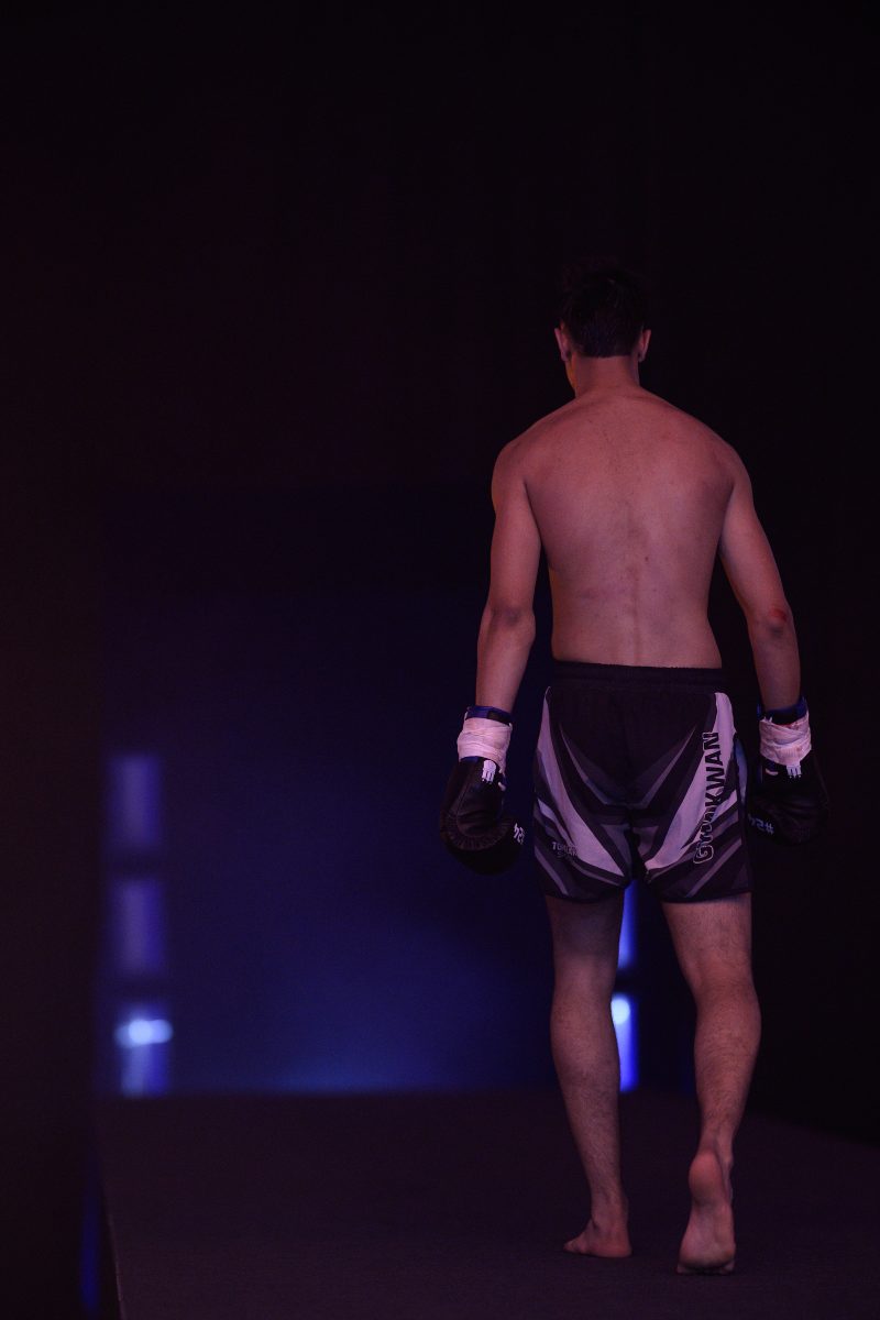 Boxers mid-fight in intense boxing match © Dirk Heurich dirksn.com