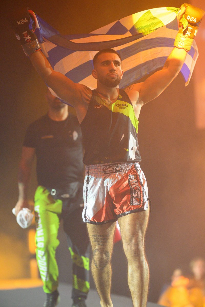 Boxers mid-fight in intense boxing match © Dirk Heurich dirksn.com