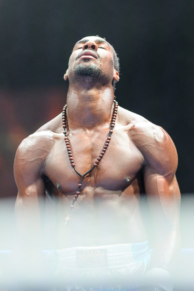 Boxers mid-fight in intense boxing match © Dirk Heurich dirksn.com